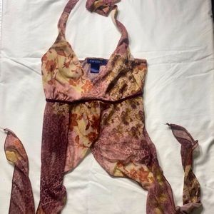 Candie’s Size small bare midriff halter top.